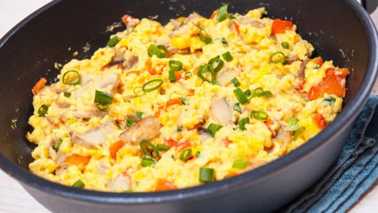 Scrambled Eggs with Fresh Corn, Goat Cheese, and Oven-Roasted Tomatoes